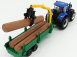 Bburago New holland T7.315 Traktor + stromový forwarder a drevo 1:50 Modrozelené drevo