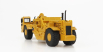 Dm-models Caterpillar Cat627g Ruspa Gommata - kolesový traktor so škrabákom 1:87 žltá čierna
