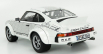 Schuco Porsche 911 Coupe s postavičkou Waltera Rohrla 1969 1:18 biela čierna
