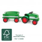 Malý nožný drevený traktor s vlečkou zelenej farby