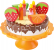 Malá noha Drevený narodeninový ovocný koláč